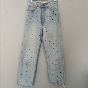 Levi’s ribcage high waisted jeans with multicolored embellishments. Size 27